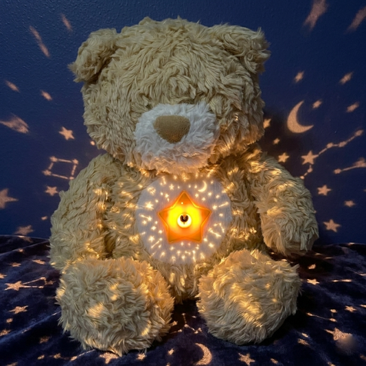 Teddy bear with glowing star light on a dark blue background with celestial patterns